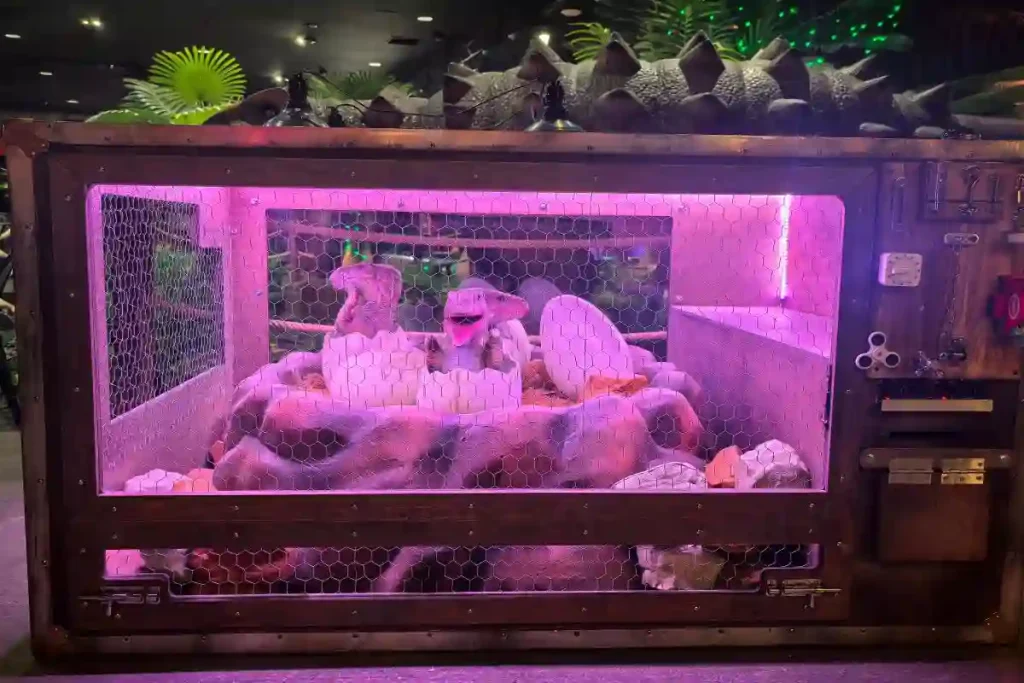 Animatronic dinosaurs hatching enclosure