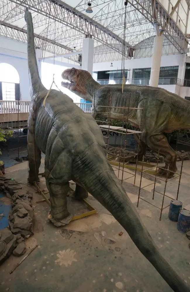 installed animatronic dinosaur in attraction environment