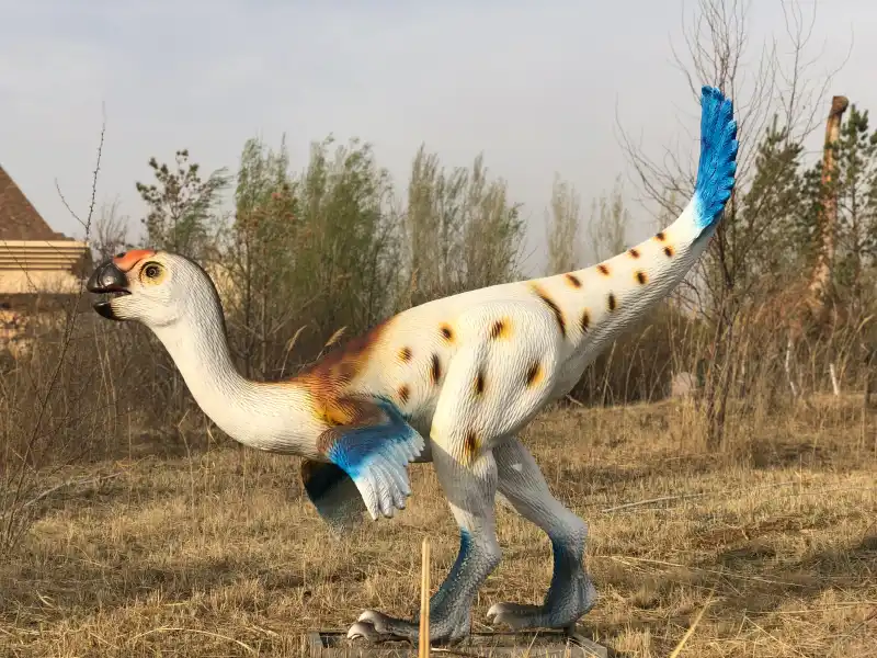 Archaeornithomimus animatronic model with blue feathers - ancient ostrich-mimic dinosaur for museum displays