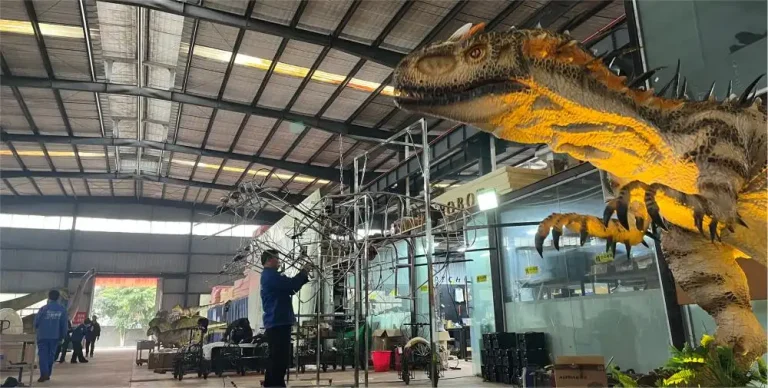 Professional animatronic dinosaur manufacturer facility showing large-scale T-rex production and steel frame construction