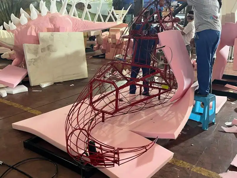 Custom animatronic solutions featuring internal steel frame structure and precision foam carving for scalable production