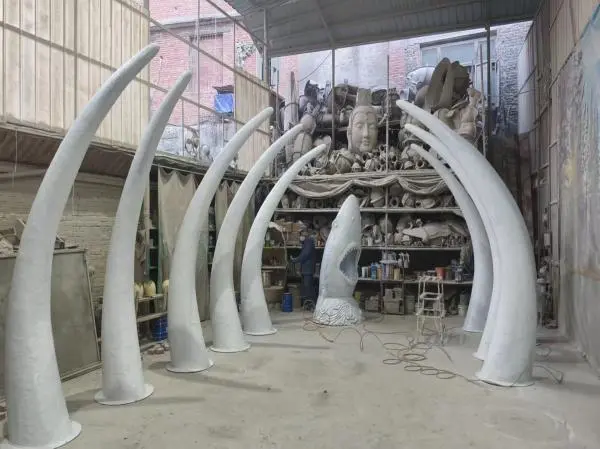 Fabrication of large-scale custom ivory arch structures for the entrance of an animatronic dinosaur project.