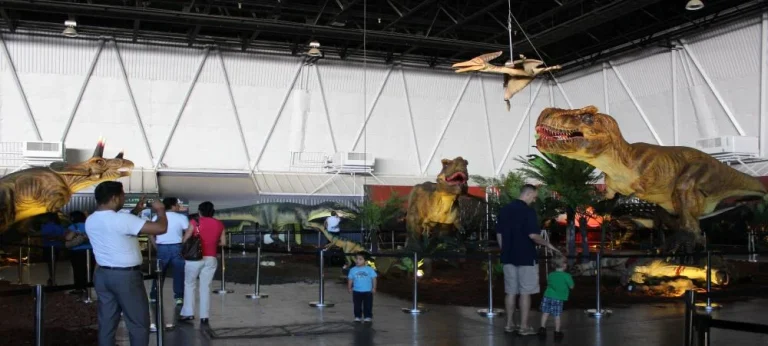 dinosaur-themed event layout showing visitor flow and crowd management at temporary exhibition