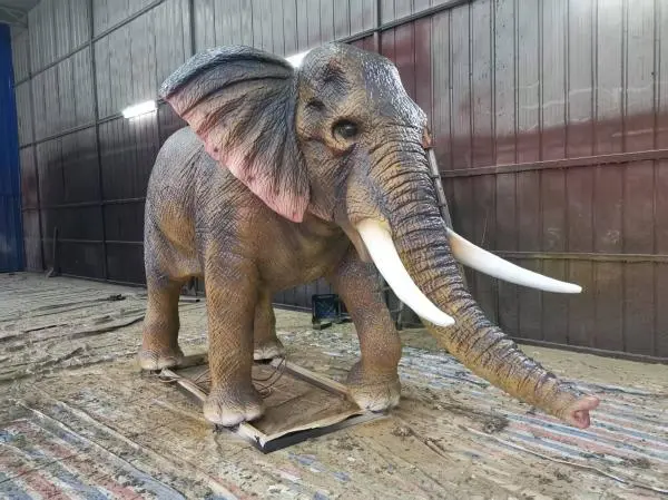 Completed highly realistic animatronic elephant with detailed skin, ready for installation at an animatronic dinosaur park.